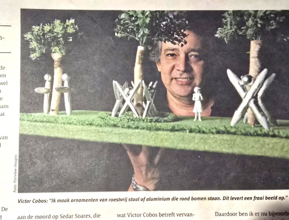 Rex Mundio met boombeschermer maquettes